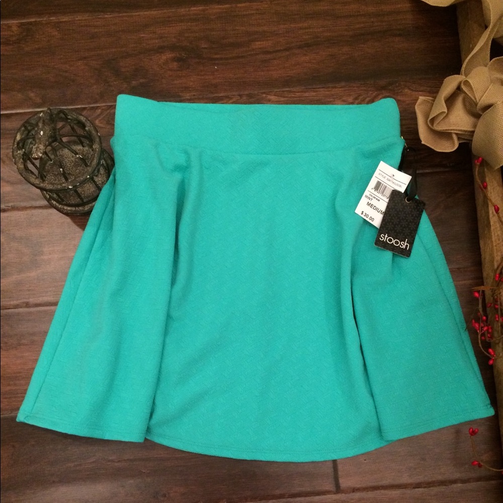 Teal green textured mini skirt